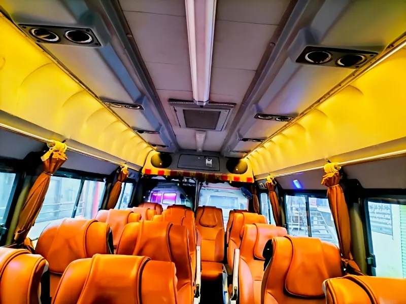 SelectBus 17-seater non-AC Tempo Traveller full interior seating view for tours